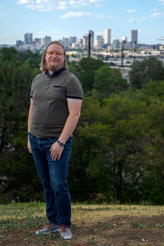 Photo of Gabriel standing in front of Denver